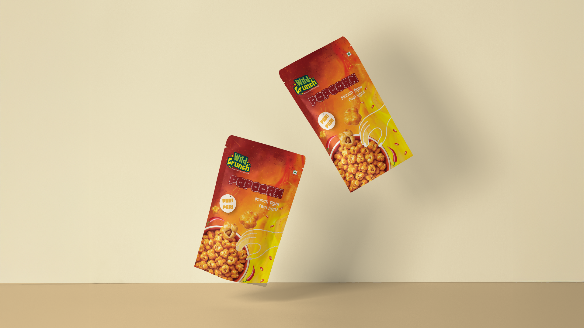 Two Peri Peri popcorn pouches floating against a cream wall